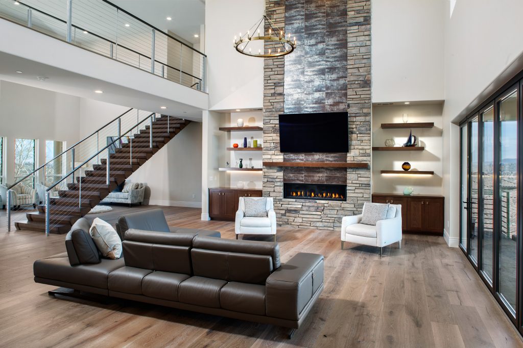 family room fire place and floating stairs