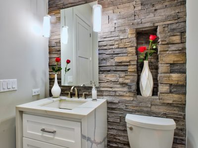 white vanity powder room with stone wall-www.vkhourydesign.com