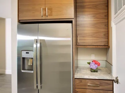 kitchen-design-walnut-cabinets-stainless-steel-refrigrator