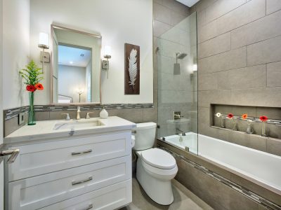 white and gray bathroom with tub-www.vkhourydesign.com